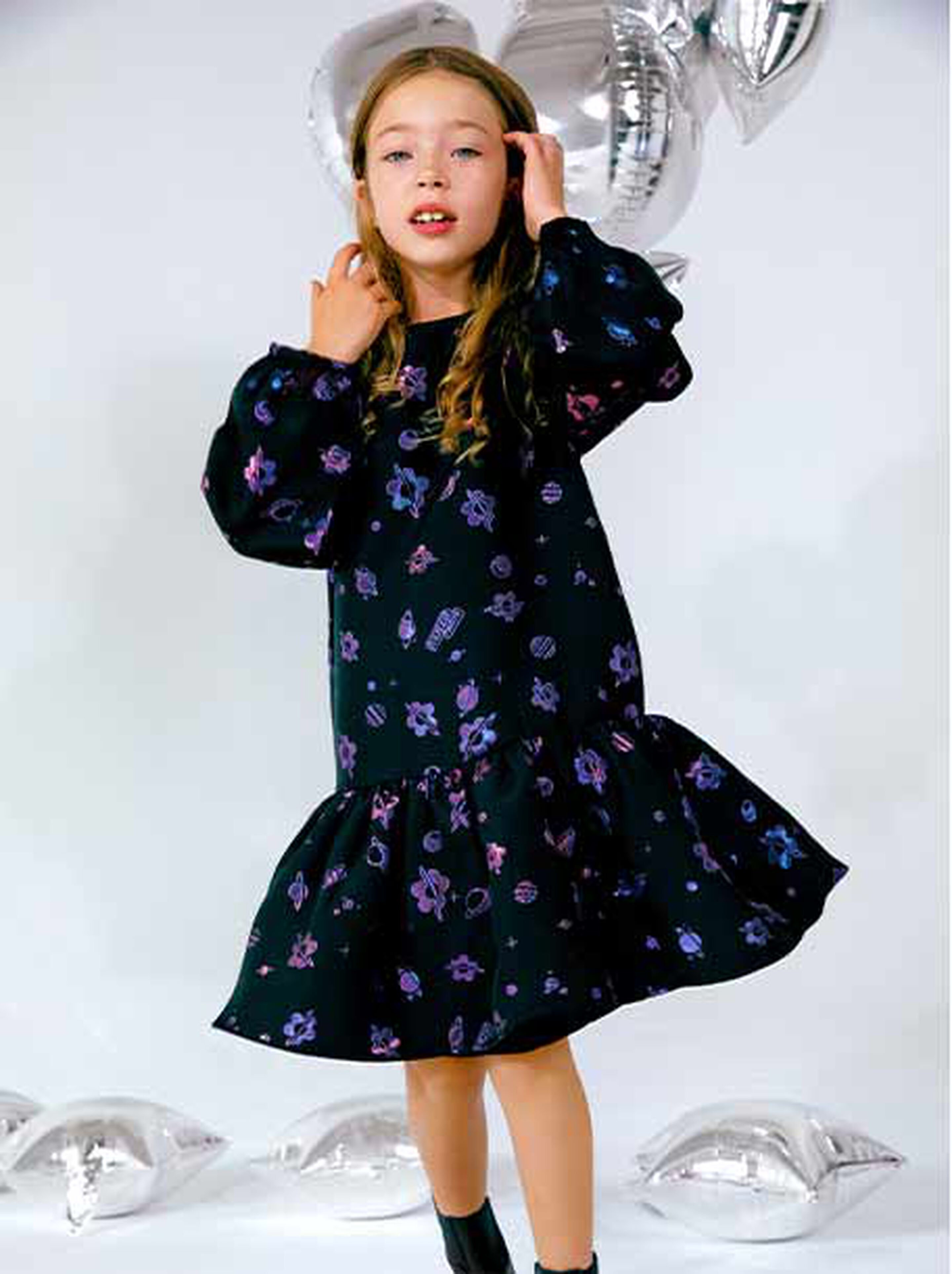 Close-up of a child’s sequined holiday outfit