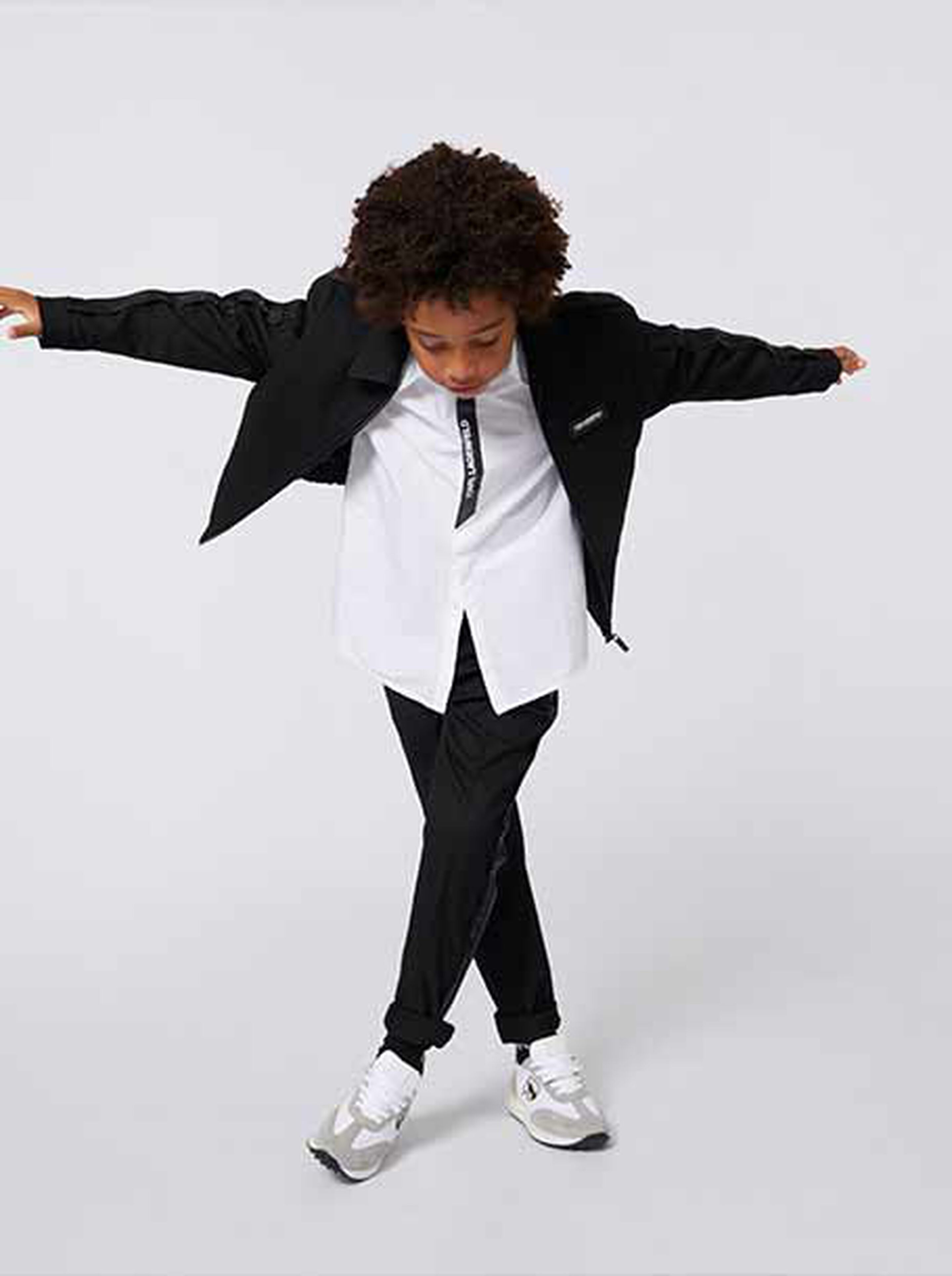 Family workshop creating handmade Halloween decorations together.