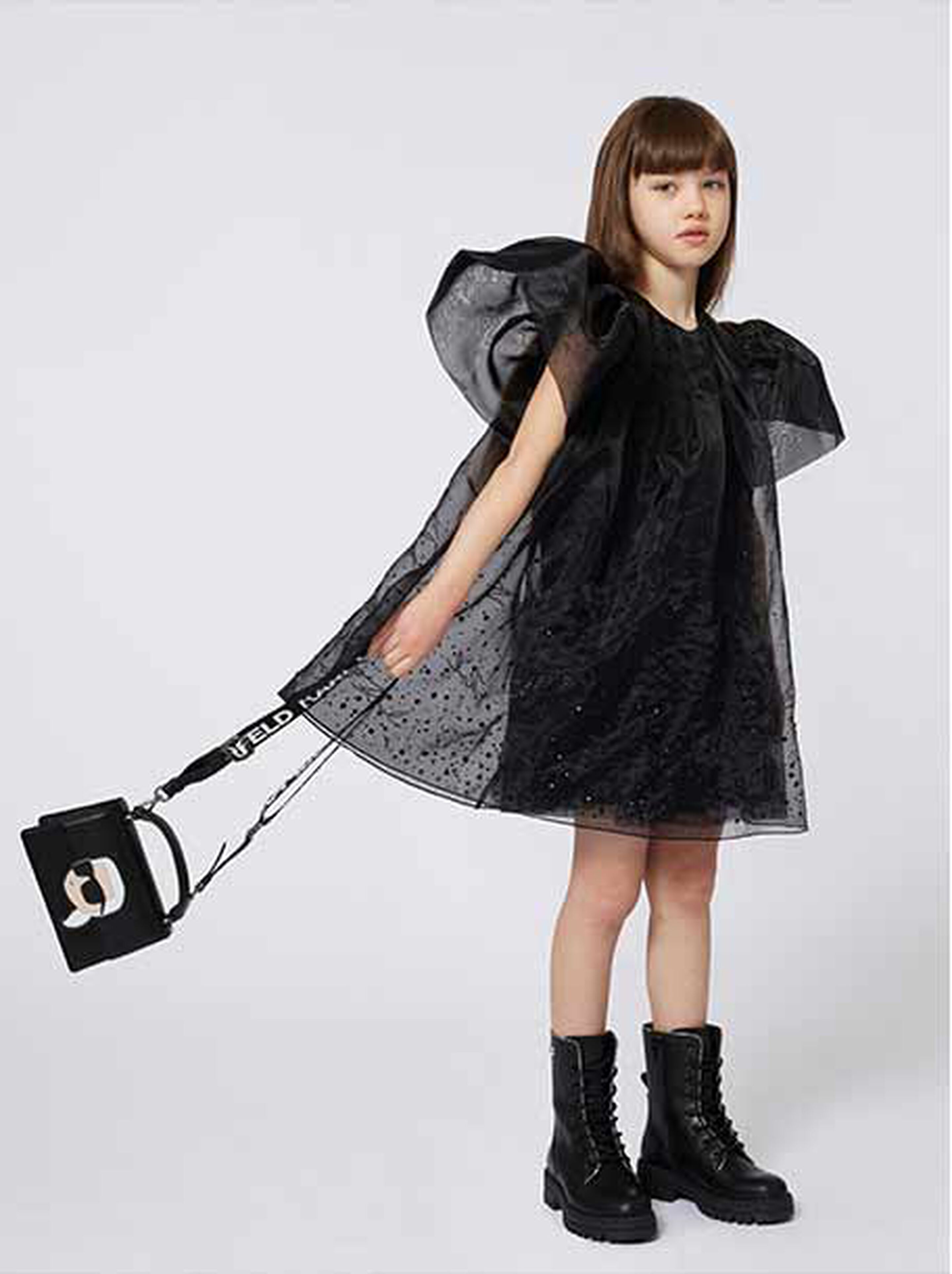 Kids decorating the house for Halloween with fun DIY crafts.