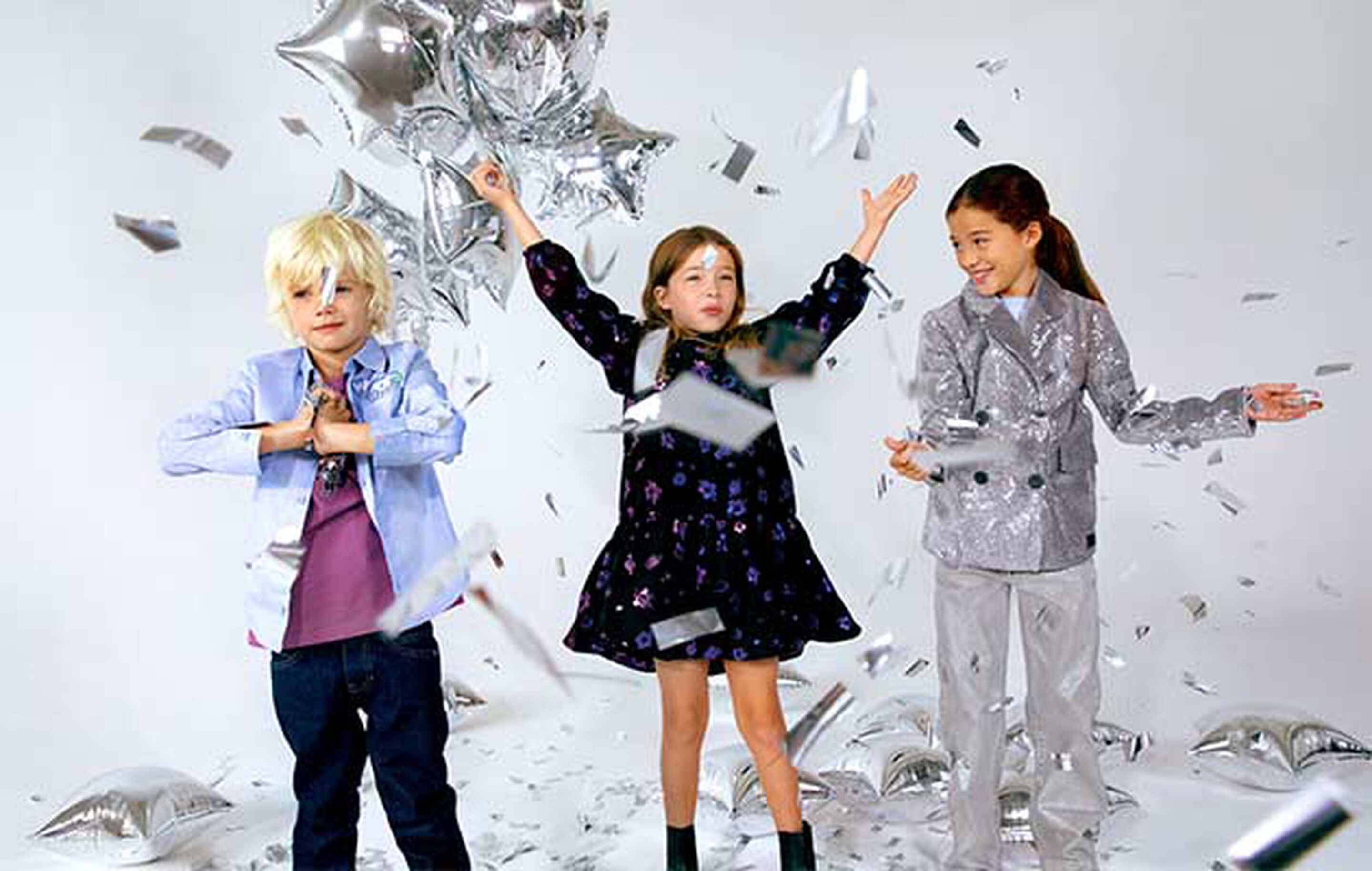 Boy dressed in an elegant suit with a bow tie for the holidays