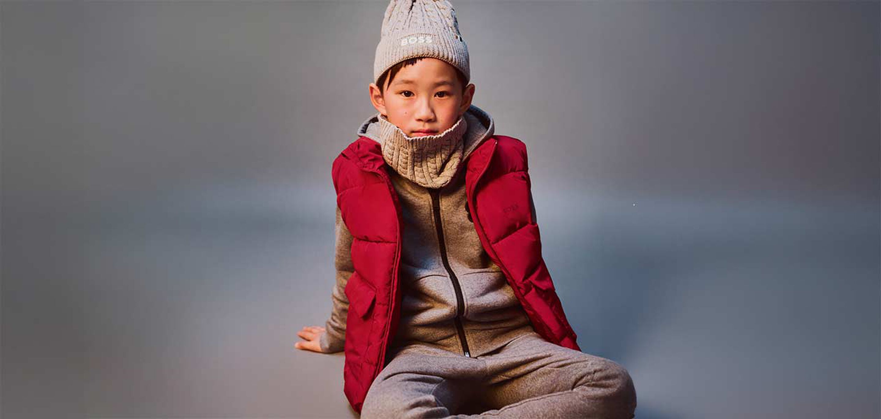 Winter 2025 children’s fashion colours blending elegant neutrals and deep blue accents