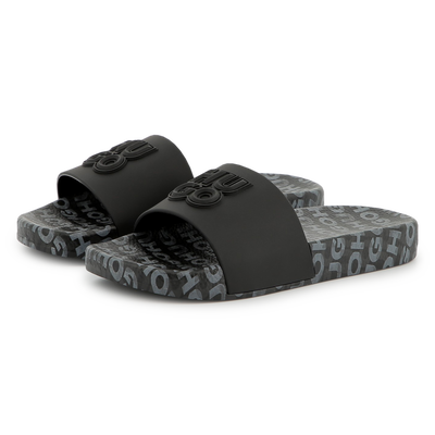 Leichte Pantoletten mit Badges HUGO BOY