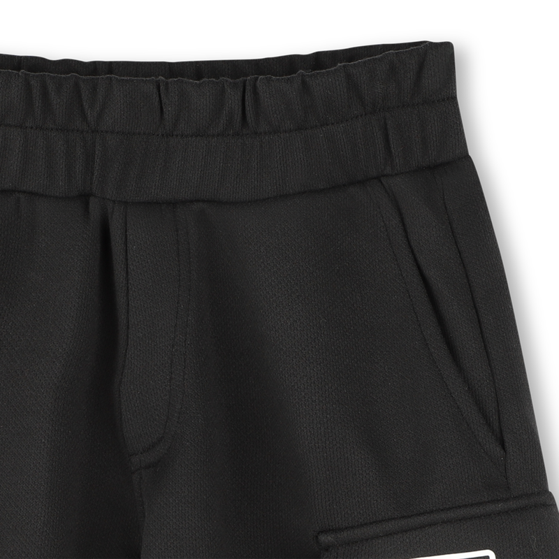 Bermudas mit Taschen DKNY 
                        UNISEX