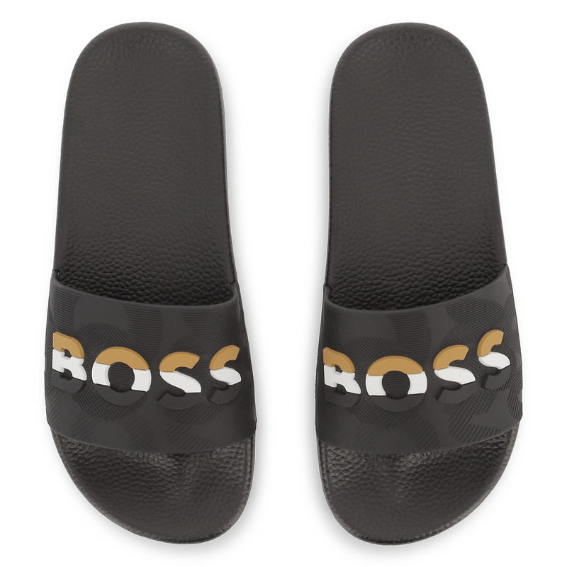 Pantoletten mit breitem Riemen BOSS 
                        BOY